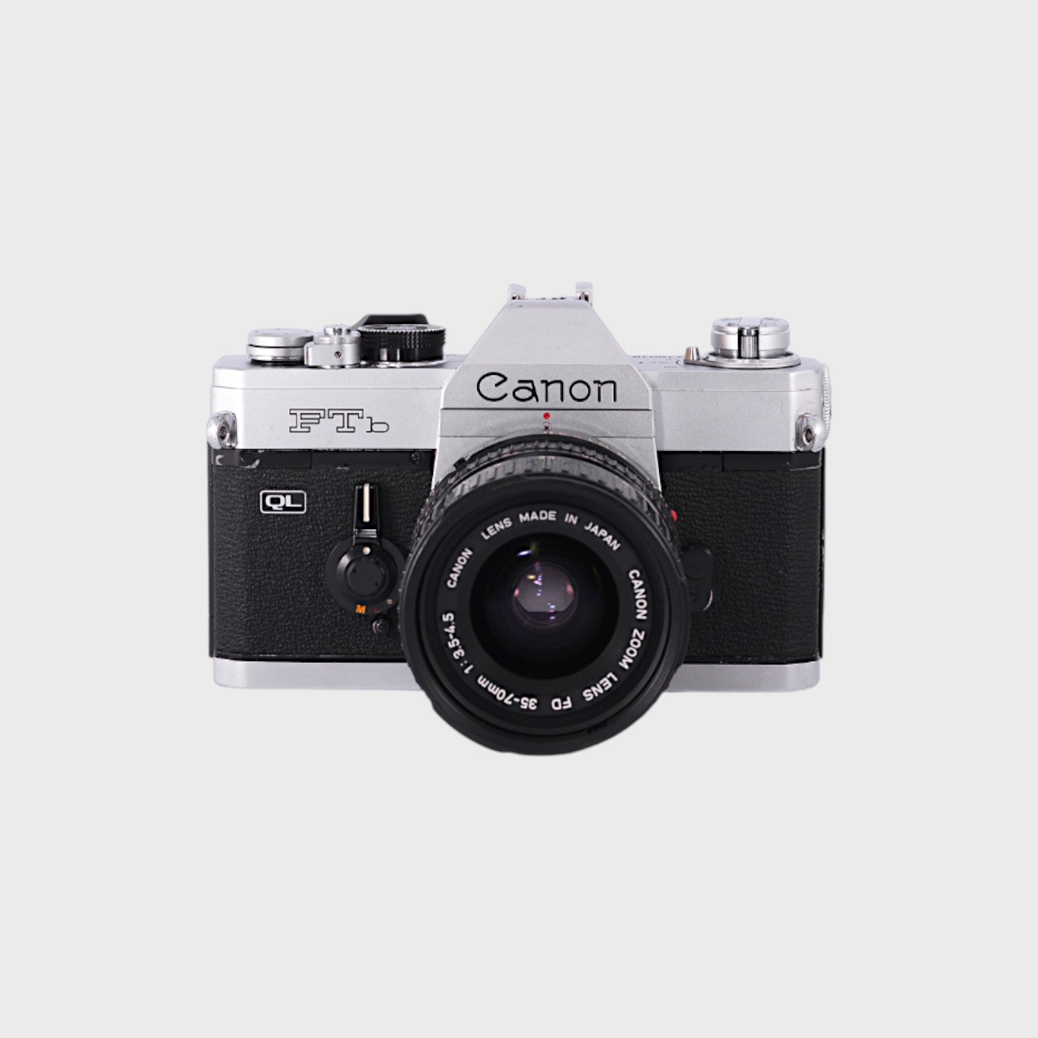 Appareil photo argentique Canon FTb QL + objectif NFD 35-70mm f4 MF Appareil photo argentique Canon FTb QL + objectif NFD 35-70mm f4 MF