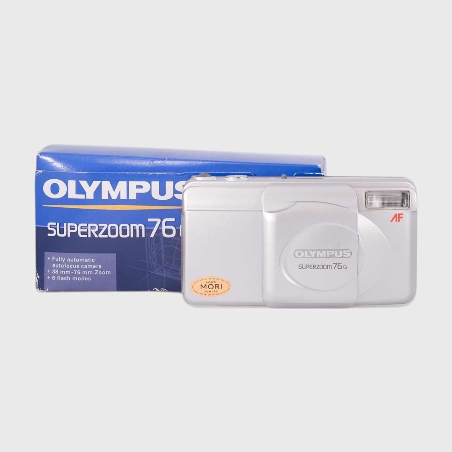 NOS: Olympus SuperZoom 76g 35mm point & shoot camera with 38-76mm