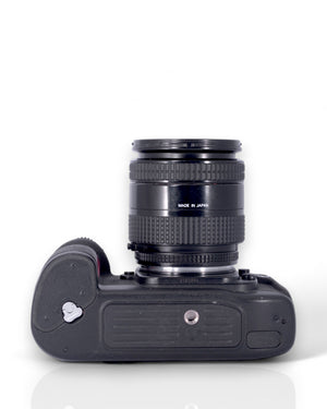 Nikon F100 35mm SLR film camera with 24-50mm zoom lens