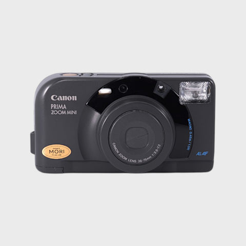 Canon Prima Zoom Mini Point & Shoot 35mm argentique avec objectif 38-76mm