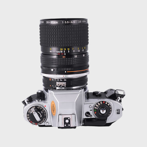 Appareil photo Reflex 35mm argentique Nikon FG Reflex 35mm argentique  objectif zoom 28-85 mm