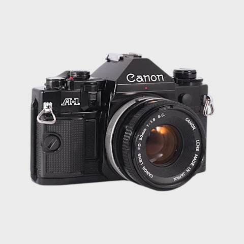 avec boîte: Reflex 35mm argentique Canon A-1 Reflex 35mm argentique  objectif 50 mm f/1,8