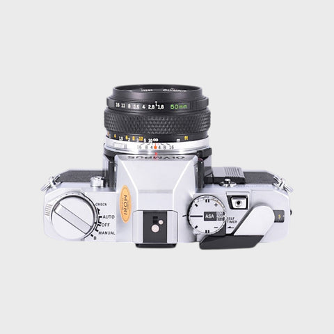 Olympus OM30 35mm SLR film camera with 50mm f1.8 lens