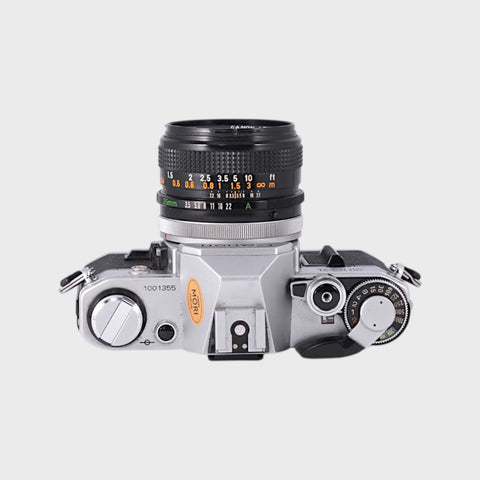 Canon AE-1 35mm SLR film camera with 35mm f3.5 lens