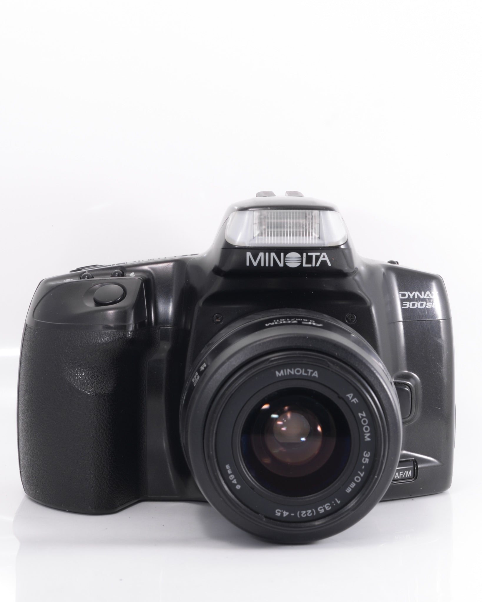 Minolta Dynax 300si 35mm SLR film camera with 35-70mm f4 lens