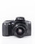 Minolta Dynax 5xi 35mm SLR film camera with 35-70mm zoom lens